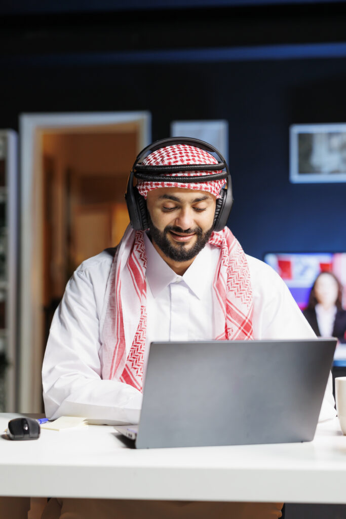 arab guy utilizing wireless technology